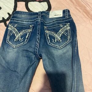Stylish Blue Jeans with Embroidered Pockets